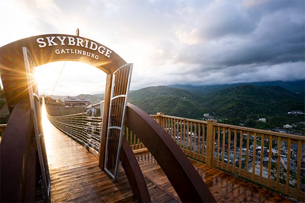 Sun beam shining through the entrance gate to Gatlinburg SkyBridge, overlooking Gatlinburg, TN