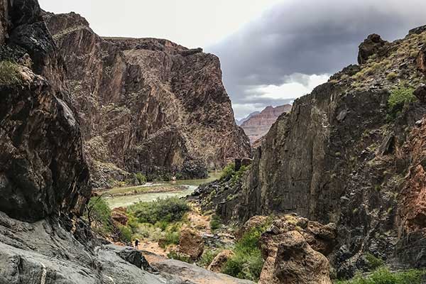 View of Colorado River from Travertine Grotto, Grand Canyon West cliff faces on both sides